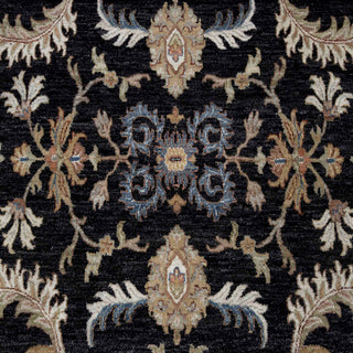 10x14 Hand-knotted wool rug featuring large floral pattern in navy cream rust, high-pile durable.