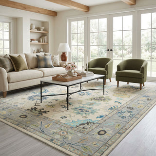 Oushak-style hand-knotted rug in ivory and light blue with floral medallion design, 10x14.