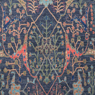 6x9 ft Hand-knotted wool rug featuring all-over floral pattern in navy coral sage ivory.