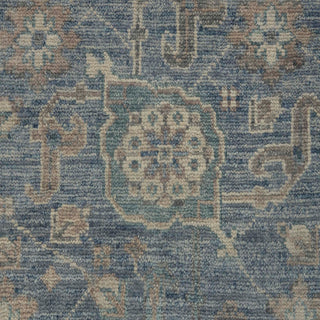 8x10 Hand-knotted wool rug featuring muted Oushak botanical pattern in blue, beige, sand tones,
