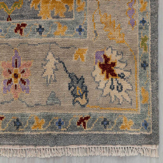 Modern hand-knotted rug with abstract Oushak-inspired pattern in charcoal grey and soft pastels