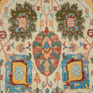 8x10 ft Hand-knotted wool rug featuring asymmetrical floral pattern in ivory teal coral green.