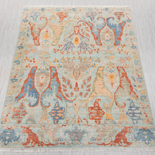 8x10 ft Indo-Persian hand-knotted rug in celadon coral teal with floral vine design.