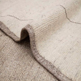 8x10 uneven diagonal weaves distressed, organic texture, evoking hand-knotted Berber natural wool rugs