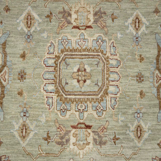 9x12 ft Hand-knotted wool rug featuring sparse floral pattern in sage teal ivory, low-pile durable.