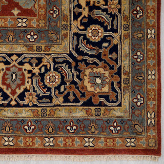 Traditional oriental hand-knotted wool rug, rust background, navy floral border, room-size 9x12
