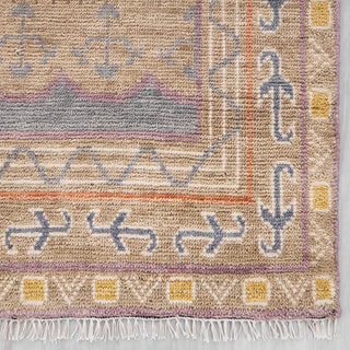 Large 9x12 living room rug, soft low-pile wool, pastel geometric design, elegant modern statement carpet.