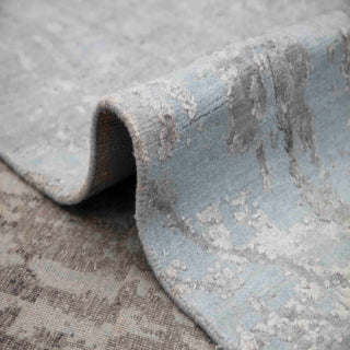 Abstract hand-knotted rug in soft grey blue-grey with distressed cloud design. 9x12 ft area rug