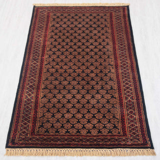 Gabbeh-style hand-knotted rug in black, rust, burgundy with small boteh lattice design, 3x5 ft