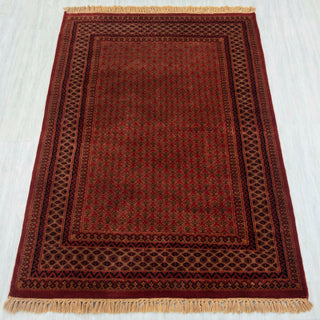 Gabbeh-style hand-knotted rug in brick red, olive, camel with tiny floral lattice design, 4x6 ft