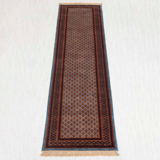 Gabbeh-style hand-knotted runner rug in blue, rust, burgundy with lattice pattern design, 2.6x10 ft
