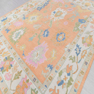 Hand-knotted rug in apricot orange and ivory with oversized floral Oushak design, 9x12 ft