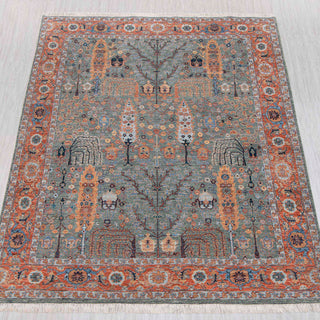 Hand-knotted rug in blue-grey and terracotta with Persian garden and tree-of-life pattern design.