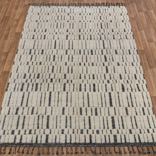 Hand-knotted rug in ivory and charcoal grey with geometric broken-grid pattern design, 8x10.
