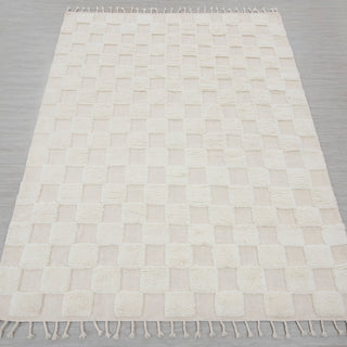 Hand-knotted rug in ivory and cream with checkerboard high-low square pattern design
