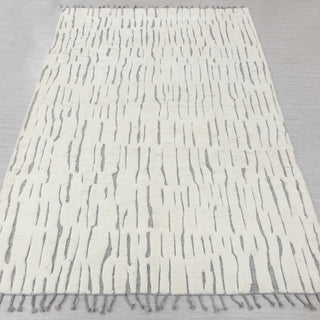 Hand-knotted rug in ivory and grey with irregular abstract linear stripe pattern design