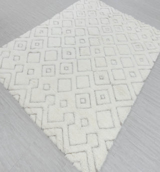 Hand-knotted rug in ivory and light grey with Moroccan diamond lattice design, plush pile