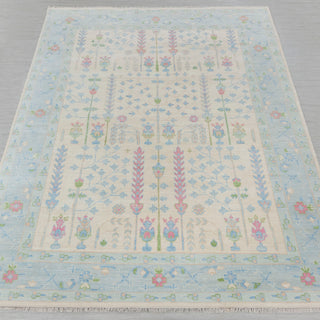 Hand-knotted rug in ivory and sky blue with pastel tree-of-life floral design, 8x10 ft