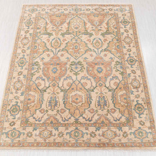 Hand-knotted rug in ivory, camel, and light blue with allover floral palmette design, 9x12.