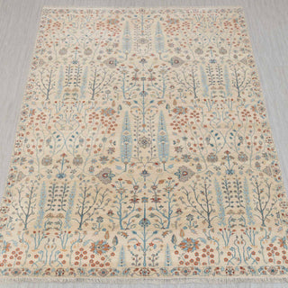 Hand-knotted rug in ivory, sky blue and terracotta with Persian garden floral and cypress tree design.