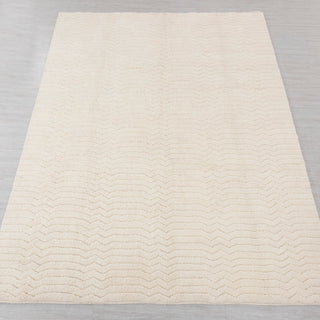 Hand-knotted rug in ivory with subtle tone-on-tone chevron pattern design, large area size