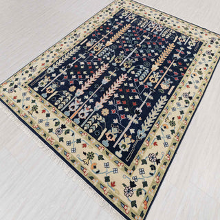 Hand-knotted rug in navy, ivory and multicolor with Persian garden tree-of-life pattern design.
