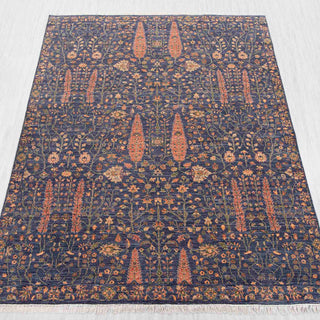 Hand-knotted rug in navy, terracotta and gold with intricate Persian allover floral garden pattern design.