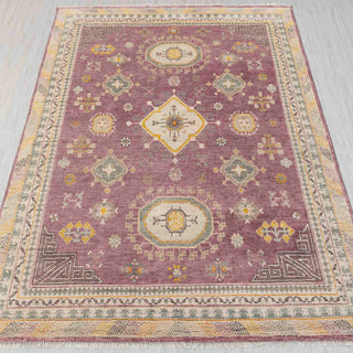 Hand-knotted rug in plum, gold, and ivory with scattered medallion and floral design, 8x10.