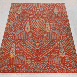 Hand-knotted rug in terracotta, blue and gold with intricate Persian garden pavilion pattern design.
