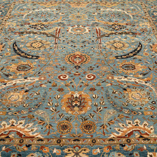 Hand-knotted wool area rug featuring aqua floral pattern with rust and gold border, 8x10 living room