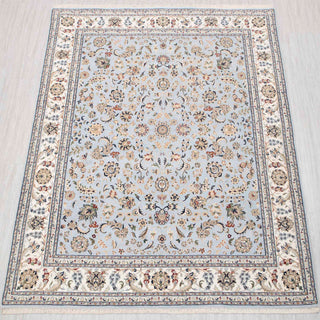 Hand-knotted wool area rug featuring dense floral pattern in baby blue, ivory, beige, 8x10 size