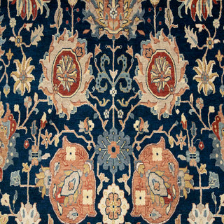 Hand-knotted wool area rug featuring navy field, rust floral border 10x14 ft rug for living room

