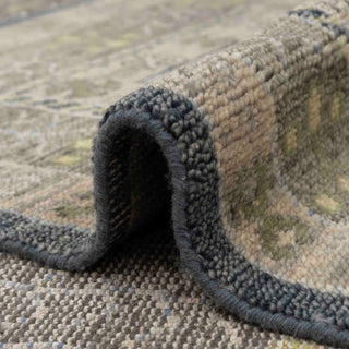 Hand-knotted wool area rug in olive green with neutral patterned border, durable 8x10 living room size.