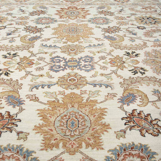 Hand-knotted wool rug featuring Persian floral pattern in ivory, beige, blue, 8x10 size.