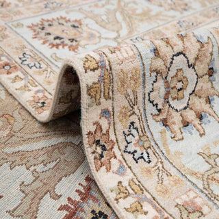 Hand-knotted wool rug featuring Persian floral pattern in ivory, blue, beige, 9x12 ft.