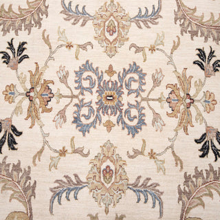 Hand-knotted wool rug featuring Persian floral pattern in ivory, taupe, blue, 12x15 size.
