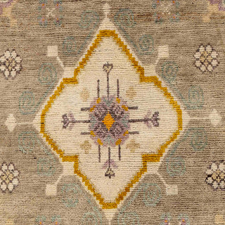 Hand-knotted wool rug featuring central medallion, soft florals, tribal border in brown, gold, green, 8x10.