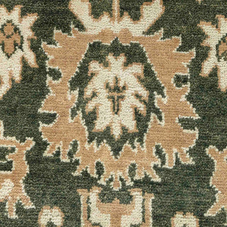 Hand-knotted wool rug featuring classical green field with beige floral medallions and ivory border, large 10x14 size.