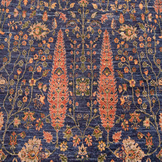 Hand-knotted wool rug featuring cypress trees and blooming vines in dark blue, rust and soft gold, 8x10 ft.