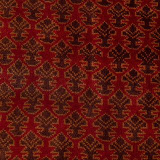 Hand-knotted wool rug featuring dense boteh repeat in rust and olive on red field, 6x9 area rug.
