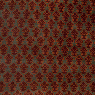 Hand-knotted wool rug featuring dense floral pattern in rust and olive, 5x7, soft fringe edges