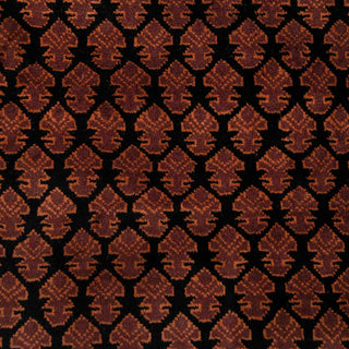 Hand-knotted wool rug featuring dense scallop boteh pattern in rust on black, 6x9 area rug