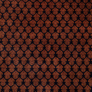 Hand-knotted wool rug featuring dense scallop boteh pattern in rust on navy, 6x9 area rug