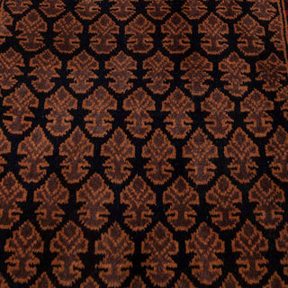 Hand-knotted wool rug featuring dense tribal boteh pattern on black field with red geometric border, 3x5 size