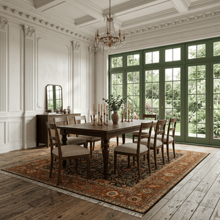 Hand-knotted wool rug featuring dense tribal lattice and floral pattern in deep navy field with rust border