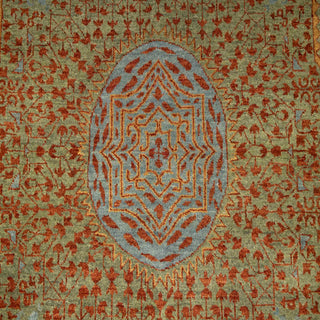 Hand-knotted wool rug featuring detailed allover floral and octagonal medallion pattern in rust, green, blue, 8x10.