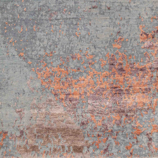 Hand-knotted wool rug featuring faded patina pattern in copper grey tones, 9x12 feet.