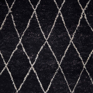 Hand-knotted wool rug featuring fine ivory diamond grid on deep black background, modern 8x10 area.