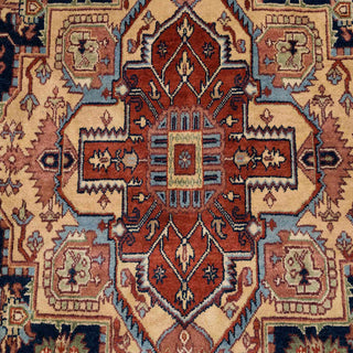 Hand-knotted wool rug featuring geometric Persian medallion pattern in navy, rust, cream, 8x10 ft.