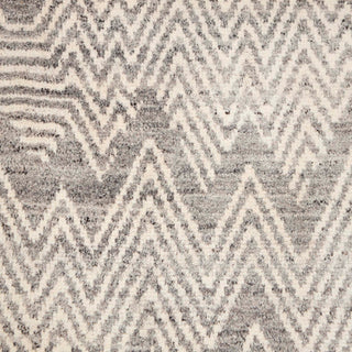 Hand-knotted wool rug featuring geometric chevron mountain pattern in grey on ivory, 8x10 size